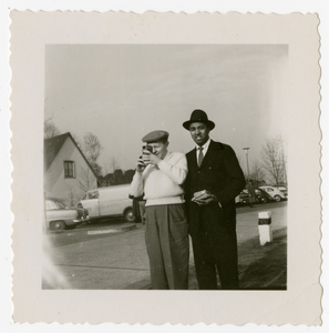 Herb Ellis (with camera) and Ray Brown, undated.] [black-and-white photoprint