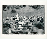 Yogi Bjahan, teaching yoga class at the summer solstice celebration