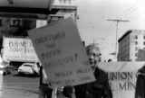 Bakke Decision Protest depicting people marching and holding protest signs in Seattle, Washington, 1977