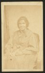 [Three-quarter-length portrait of an African American woman seated, facing front]