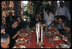 Family Being Served at Christmas Dinner Table