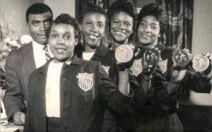 Tigerbelle Track Team and Coach Edward S. Temple With Medals From a 1958 Meet in Moscow