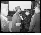 Eleanor Roosevelt awarding medal to soldier, Seattle, April 3, 1943