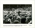 Chet Powers, AKA Dino Valenti, songwriter and friend, making their way through the crowd at the Monterey Pop. Monterey, CA, 1967.