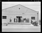 Warehouse, used as distributing office for Farm Security Administration (FSA) relief grants of commodities to destitute farm labor families during cotton strike of October 1938. Bakersfield, California