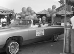 Thumbnail for Black Agenda Business Fair participants posing in a convertible, Los Angeles, 1983