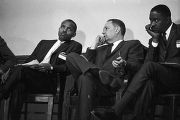 Congressman Carl Elliott seated with two other men during a meeting of educators at Alabama State College in Montgomery, Alabama.