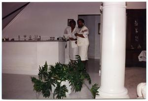 Women Near House Plant During New Member Induction Ceremony