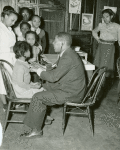 National Youth Administration youth assisting doctor in medical examination of children at the St. Simon's Center, Philadelphia, April 2, 1941