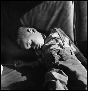 Child Sleeping in a Car