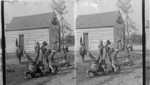 Darkie children standing on their heads. N. Carolina