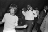 Woman and man dancing at the Laicos Club in Montgomery, Alabama, during a performance by Bobby Moore and the Rhythm Aces.