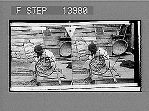 African American boy with tools and wheel. Active no. 9417 : stereo photonegative