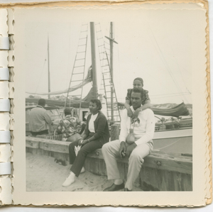 Digital image of Taylor family members by a docked sailboat on Martha's Vineyard