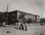 Children in the yard outside the Booker T. Washington School, at the intersection of Grove Street and South Union Street in downtown Montgomery, Alabama.