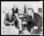 [Roy Wilkins (left) confers with President Lyndon B. Johnson at the White House about civil rights legislation]