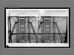 Giant steel cobwebs of the 240 feet Ferris Wheel seen from one of its cars. 5835 Interpositive