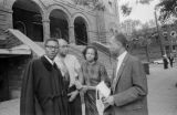 M. W. Pippen and his daughter, Juanita Jones, with two men in front of 16th Street Baptist Church in Birmingham, Alabama, after the building was bombed.