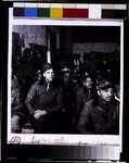 [Black fighter pilot series--Colonel Benjamin O. Davis seated with pilots at briefing in Italy]