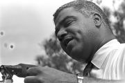 Whitney M. Young, Jr., addressing a crowd in front of the state capitol in Jackson, Mississippi, at the end of the "March Against Fear" begun by James Meredith.