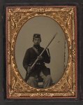 [Unidentified soldier in Union uniform with musket and bayonet in scabbard]