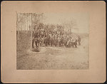 [Civil War veterans of the 57th Massachusetts Infantry Regiment with Confederate General William Mahone at the crater caused by Union soldiers exploding a mine at Petersburg, Virginia]