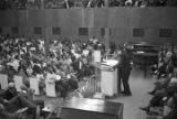 Ralph Abernathy speaking to an audience in a large, modern church building, probably in Birmingham, Alabama.