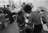 Girl getting an immunization shot at Sidney Phillips Middle School in Mobile, Alabama.