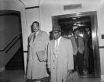 Thurgood Marshall and Arthur Shores after a hearing for Autherine Lucy at the federal courthouse in Birmingham, Alabama.