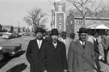 Ralph Abernathy, Martin Luther King Jr., Fred Shuttlesworth, and others marching to the Dallas County courthouse in Selma, Alabama, during a civil rights demonstration.