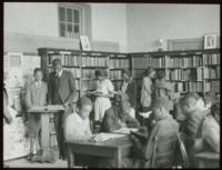 Library Scene African-American High School Age Students Reading Standing or Seated 2