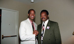 Thumbnail for Rev. Jesse Jackson posing with an unidentified man at a Tournament of roses protest rally, Pasadena, 1993