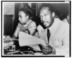 [Josh White testifying before the House Un-American Activities Committee; his wife sits beside him]