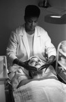 Staff at The Body Clinic apply a facial treatment, Los Angeles, 1986