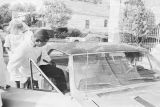 Walter Bradley and Josephine Bradford leaving Holt Street Baptist Church in Montgomery, Alabama, after their wedding.