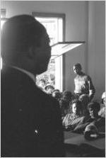 Thumbnail for Martin Luther King, Jr., speaking to an audience in a church building, probably First Baptist Church in Eutaw, Alabama.