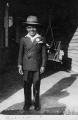 William Craig Wearing Suit on Porch, 1942