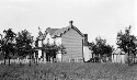 Demonstration farming after two years showing William Kelton new house and old house in rear. No debt and money in bank