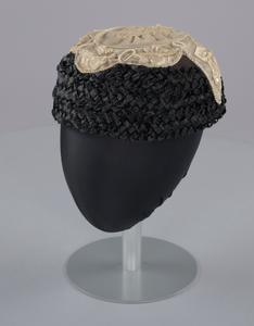 Black raffia hat with cream embellishments from Mae's Millinery Shop