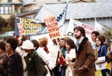 Bakke Decision Protest depicting people marching and holding protest signs in Seattle, Washington, 1977