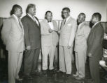 Judson W. Robinson, Sr. Receiving a Check