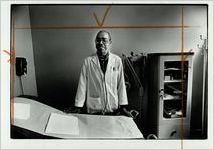 Dr. Clint Warner in one of his examing rooms, undated