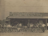 M. D. Ledbetter and others in front of the Ledbetter Cycle Company in Opelika, Alabama.