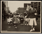 Children in the Junior Herd Dancing Club marching in parade