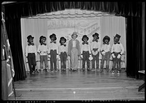 Kids performing in a blackface play