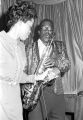 Johnny Lowery of The Sheiks playing the saxophone on stage at the Laicos Club in Montgomery, Alabama.