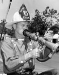 Band leader forsakes horn for hose