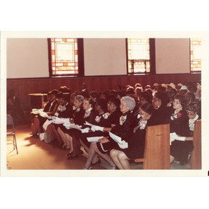 Members of Christ Temple Church sit in the pews