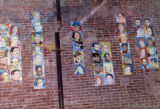 Wall of paintings in the Nuyorican Poets Cafe