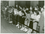 Crowds watching roller-skating exhibition, Chicago, Illinois